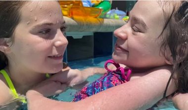 Travel / Rett Syndrome News / Ryan and Cammy swim in the pool on vacation