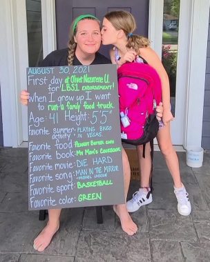 back to school | Rett Syndrome News | Jacie Babiarz gets a kiss on the cheek from her daughter, Ryan, before her first day of education to receive her special education teacher license
