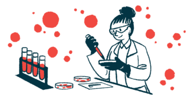 A lab scientist fills a petri dish with blood samples.