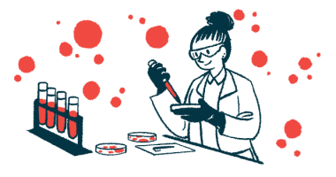 A lab scientist fills a petri dish with blood samples.